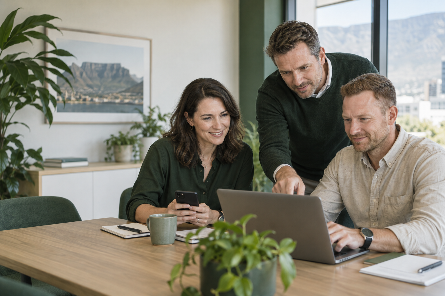 A small business team reviewing project information together
